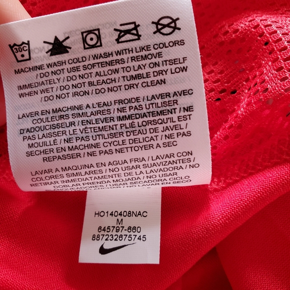 NIKE Dri-Fit Workout T with Mesh Paneling in Melon Red. - Picture 8 of 8